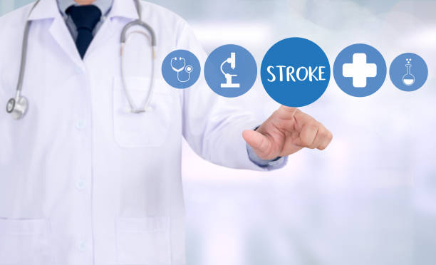 A medical doctor pointing to the stroke sign with his finger